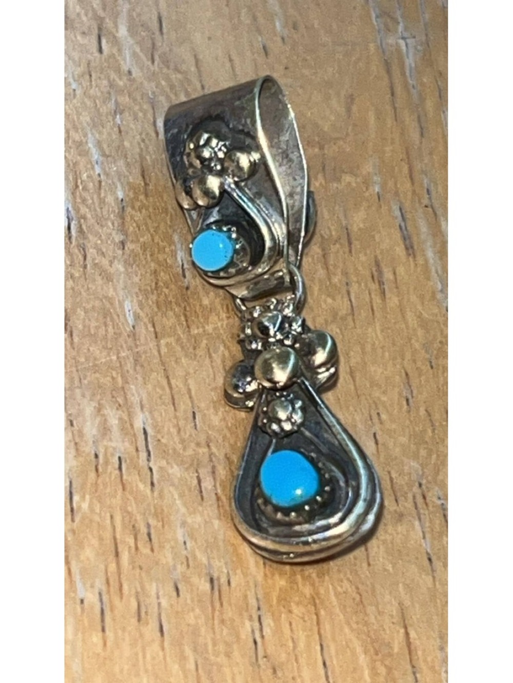 Native American Zuni sterling silver turquoise and coral reversible pendant